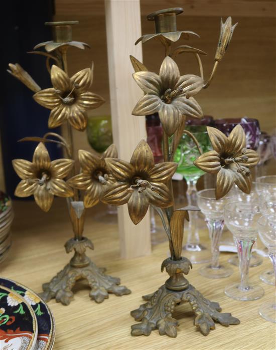 A pair of gilt metal French floral candlesticks